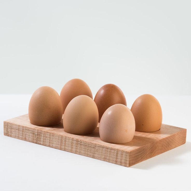 Wooden Egg Tray Smooth Finish—Perfect For Organizing Or Displaying Eggs.
